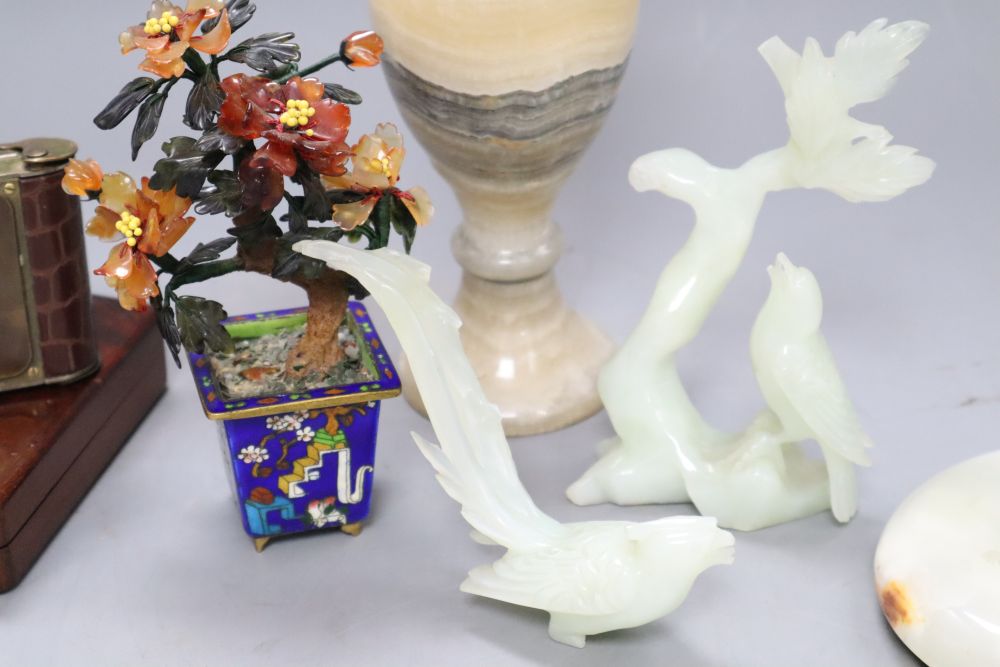 A Chinese hardstone tree, an onyx vase, a broken figure, an alarm clock and a match box